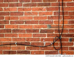 brick wall with wires