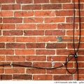 brick wall with wires